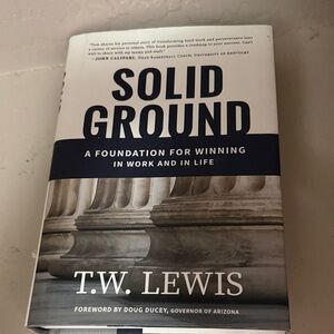 Solid Ground Book by T.W. Lewis - Black and White Cover